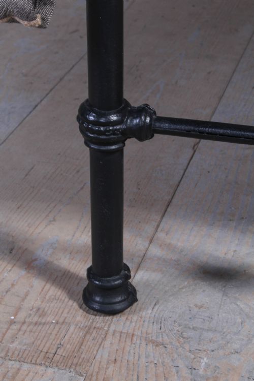fig 2. Simple black iron single bed