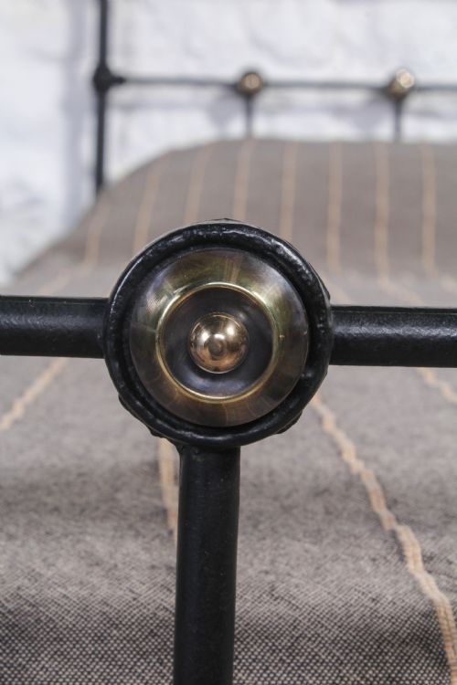 fig 3. Simple black iron single bed