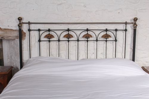 fig 2. Pretty and individual king size brass and iron bed