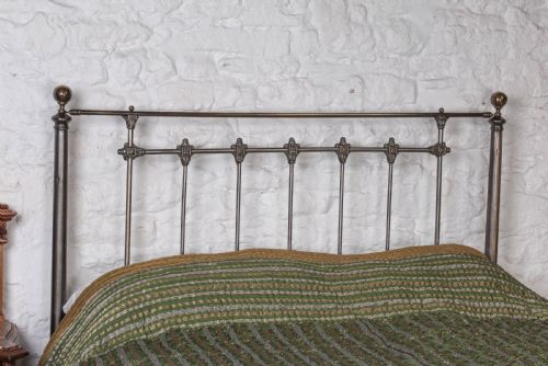 fig 3. Very handsome burnished iron and aged brass kingsize bed