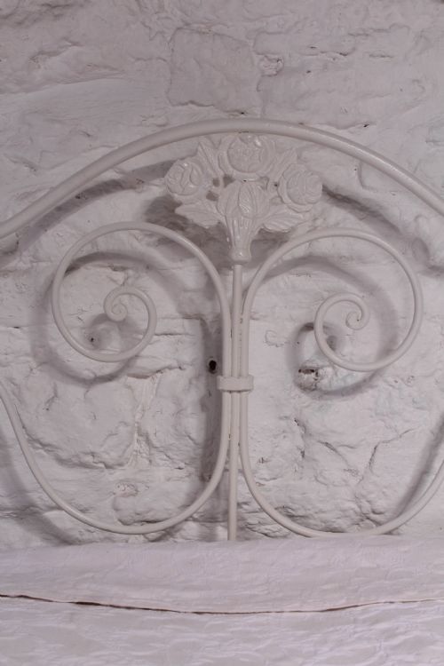 fig 2. Pretty forged iron low end bed