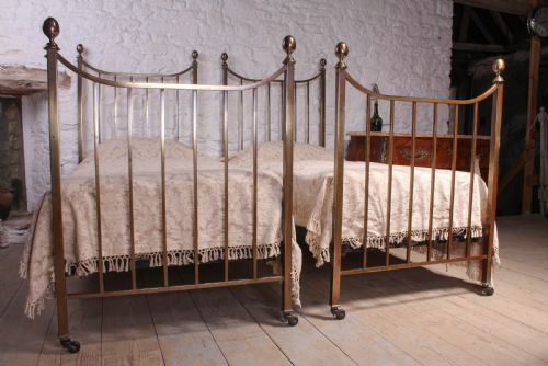 fig 1. Pair of Heals Edwardian single brass beds