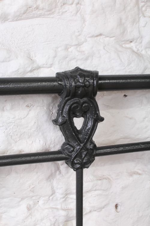 fig 3. Fashionably simple double all iron bed
