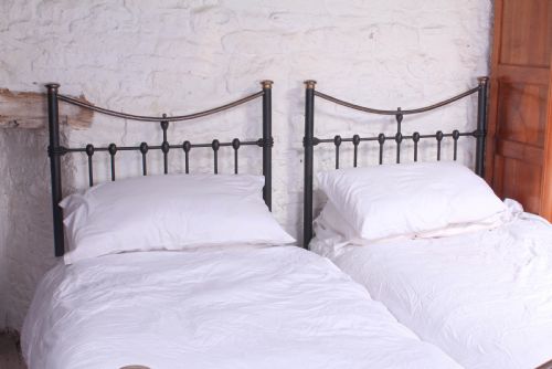 fig 2. Pair of Edwardian single brass and iron beds (can be joined)