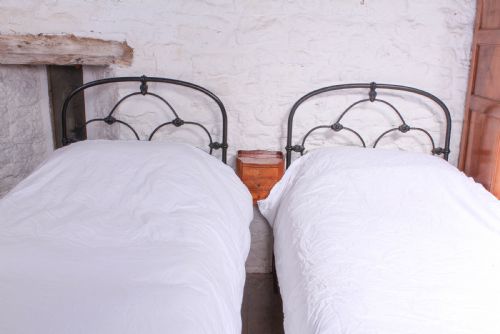 fig 3. Attractive pair of black Irish iron single beds (can be joined)