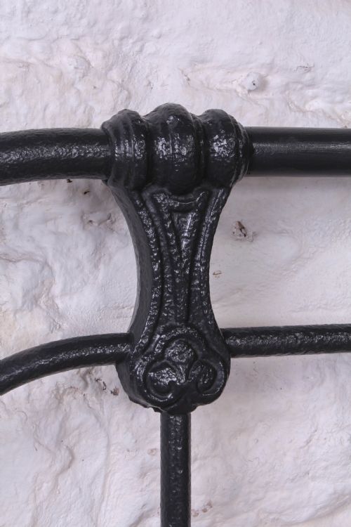 fig 2. Pleasingly simple all iron king size bed