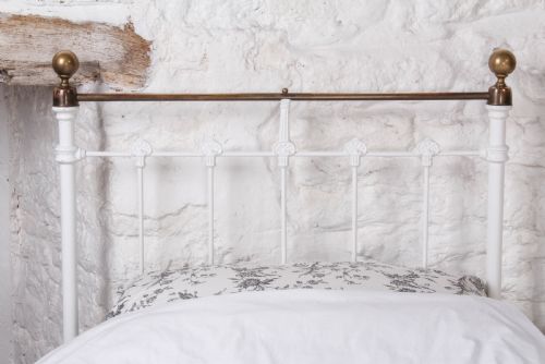 fig 2. Pretty pair of single white and brass beds with rings and spindle details (can be joined)