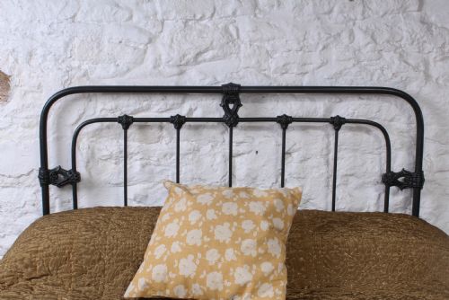 fig 1. Fashinably simple Victorian double iron bed