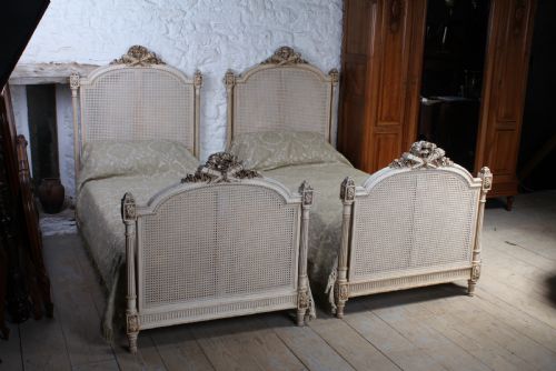 Striking Pair of French Empire Style Caned Single Beds