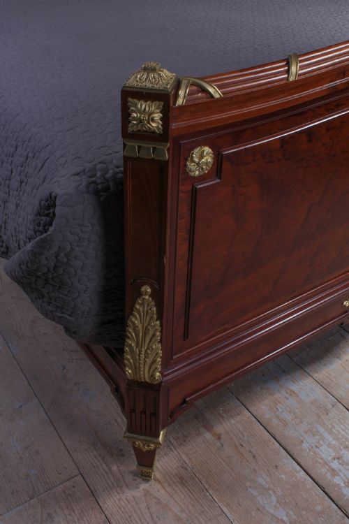 fig 3. Magnificent Louis XV1 style bed with flame mahogany panels