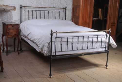 Pleasingly Simple Early Victorian Brass and Iron King Size Bed with Forged Iron Panel