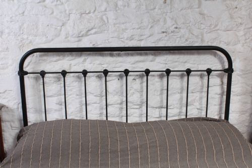 fig 1. Fashionably simple French all iron king size bed