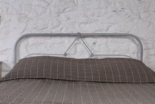 fig 2. Simple Irish cottage style double iron bed