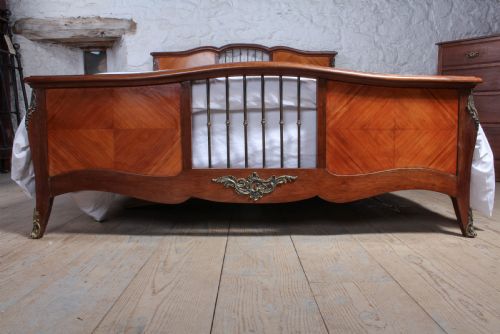 fig 3. Unusual low height walnut veneer king size bed
