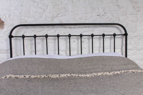 fig 2. Fashionably simple French all iron king size no end bed