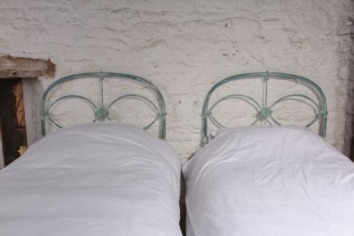 fig 1. Lovely hand finished pair of iron single beds