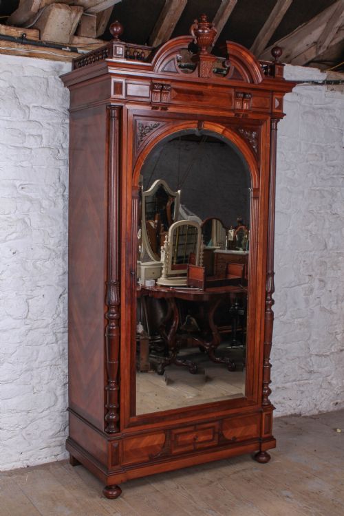 fig 1. Beautiful three mirror in one armoire
