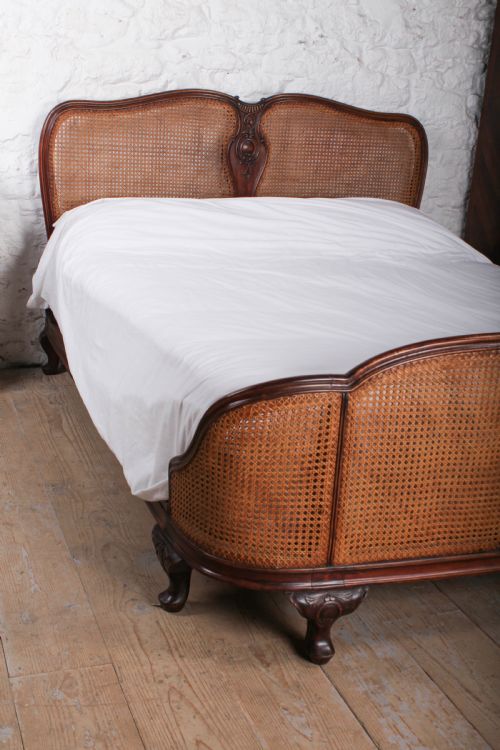 fig 2. Striking Bergere caned corbeille king size bed