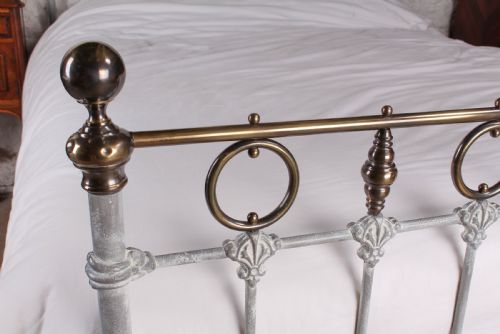 fig 2. Pretty French king size bed with rings and spindles