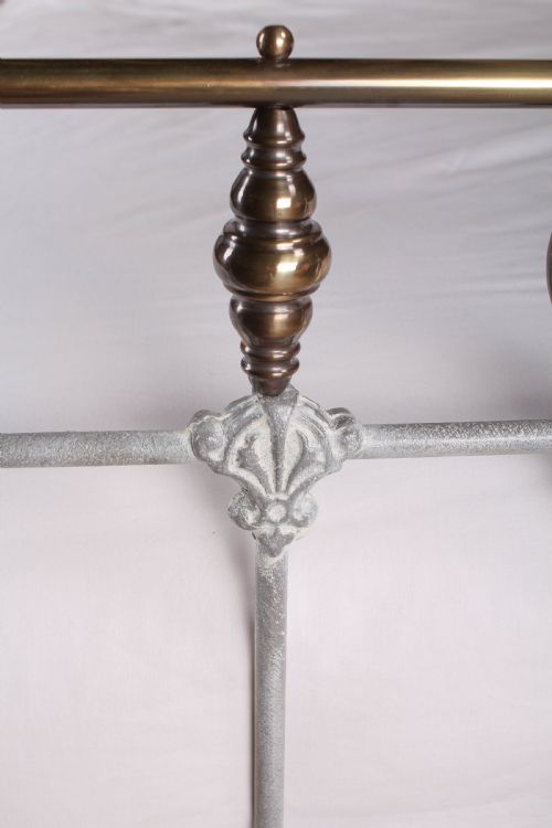 fig 3. Pretty French king size bed with rings and spindles