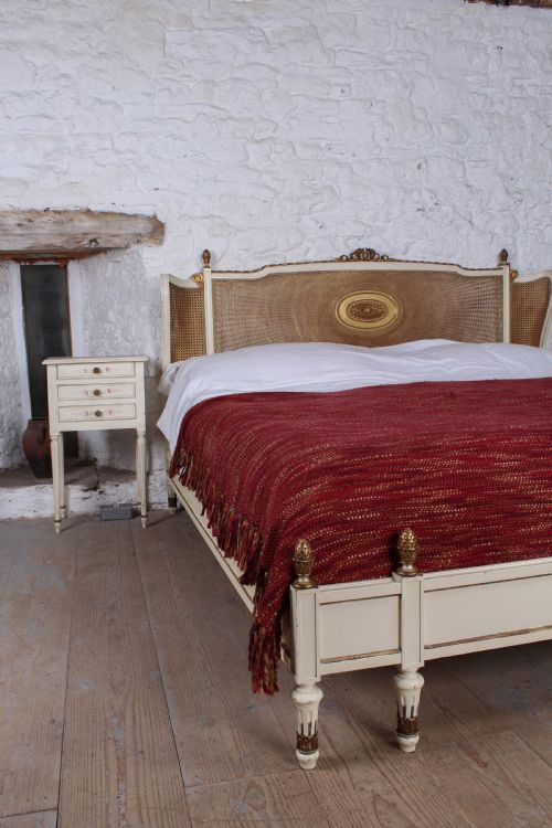 fig 1. Unique super king size Bergere caned low end bed