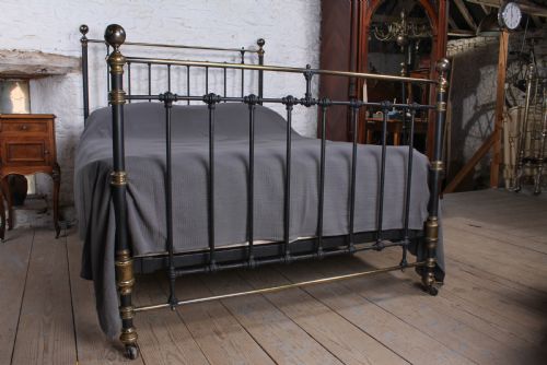 fig 2. Handsome individual Victorian king size brass and iron bed