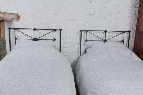 fig 3. Simple pair of Victorian all iron single beds (can be joined)
