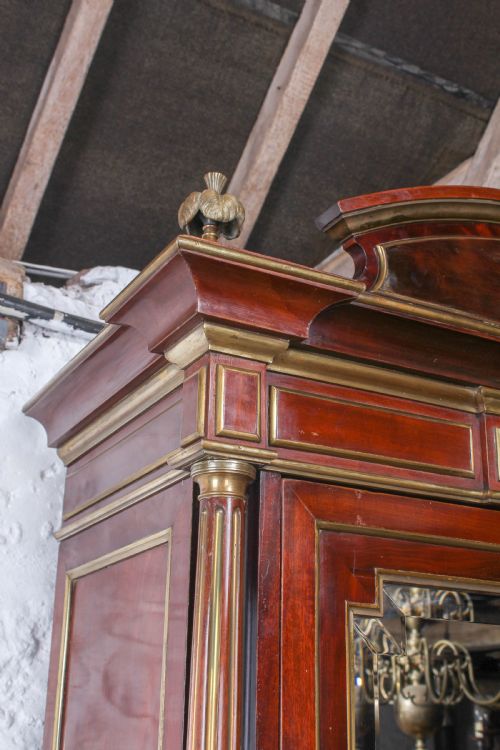 fig 1. Lovely single door mahogany armoire with brass inlay