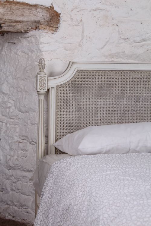fig 2. Pair of painted single caned low end bed