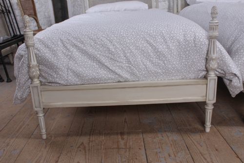 fig 3. Pair of painted single caned low end bed