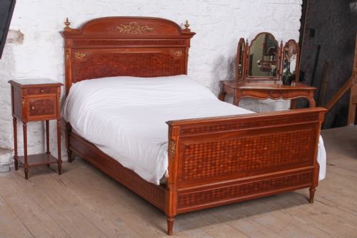 fig 1. Very attractive parquetry and ormalu double bed and matching bedside