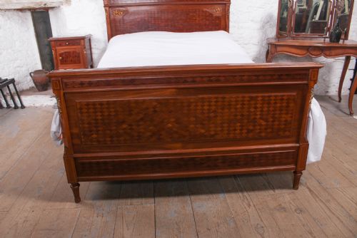 fig 2. Very attractive parquetry and ormalu double bed and matching bedside