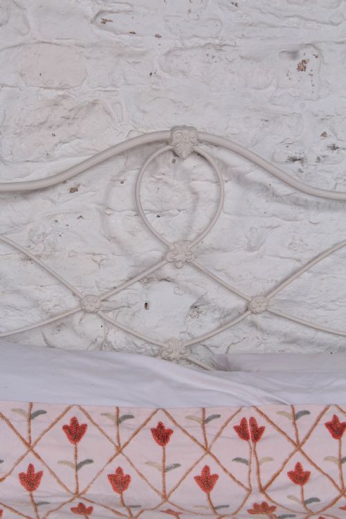 fig 3. Pleasingly shaped all iron Irish king size no end bed