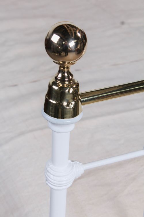 fig 1. Classic Victorian white and brass double bed