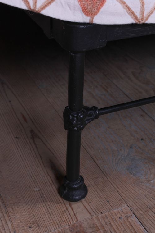 fig 1. Pleasingly simple Irish all iron king size bed