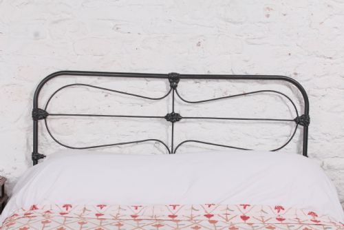 fig 2. Pleasingly simple Irish all iron king size bed