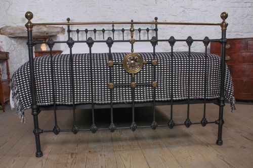 fig 1. King size Victorian brass and iron bed with mirror motif