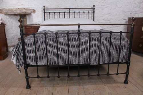 fig 1. Classic Victorian antiqued brass and iron king size bed