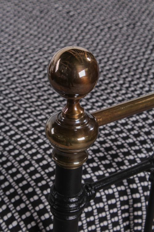 fig 2. Classic Victorian antiqued brass and iron king size bed