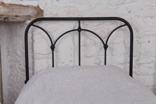 fig 3. Lovely simple pair of all iron single beds
