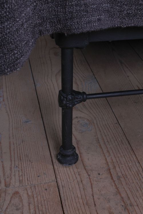 fig 2. Pleasingly simple all iron king size nioend bed