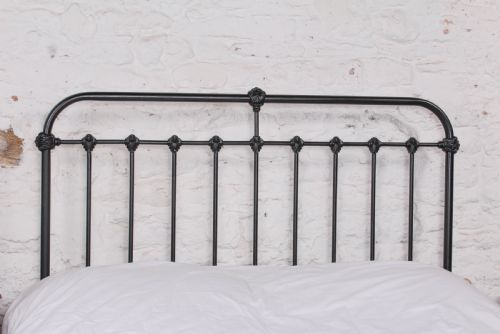 fig 1. Fashionably simple French all iron king size bed