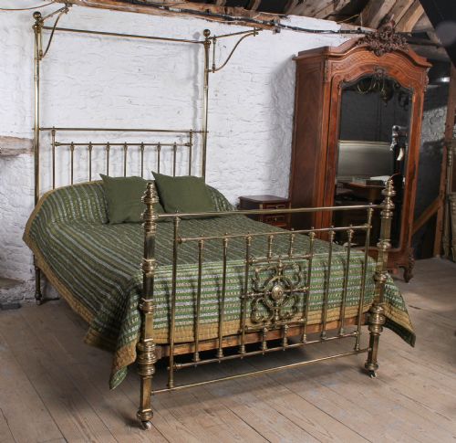 fig 2. Spectacular Victorian king size all brass half tester bed.