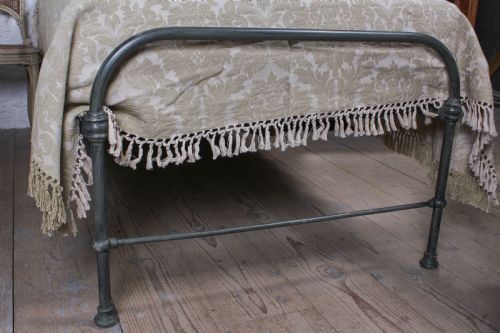 fig 3. Lovely simple pair of utilitarian single iron beds