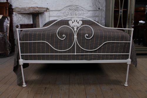 fig 1. Pretty king size forged iron bed