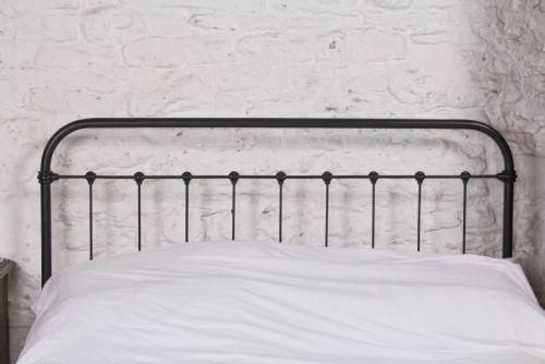 fig 2. Pleasingly simple French all iron king size bed