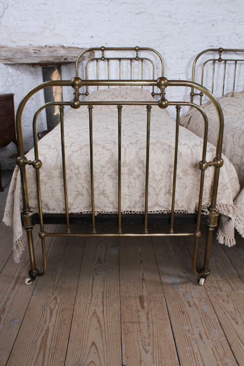 fig 1. Interesting pair of all brass single beds