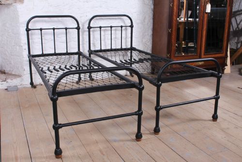 fig 1. Fab pair of iron dormitory style small single beds