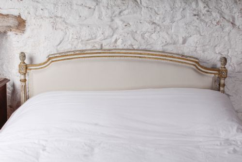 fig 2. Aged gilded paint work newly upholstered French double bed
