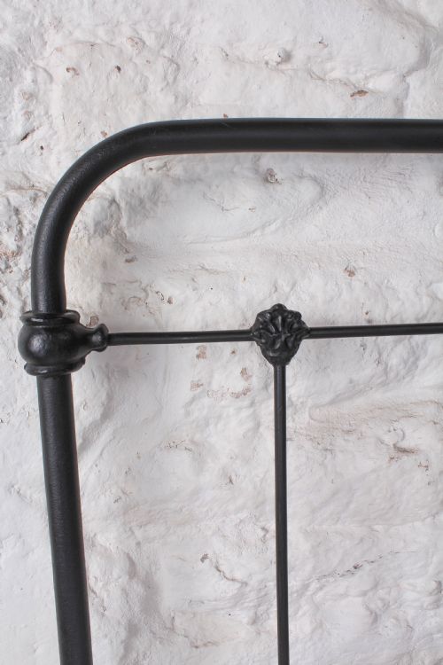 fig 2. Pleasingly simple all iron no end double bed